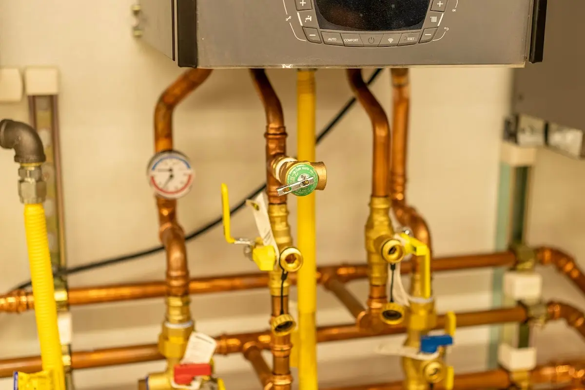 Licensed technician providing Water Heater Installation for a homeowner in Kewaskum